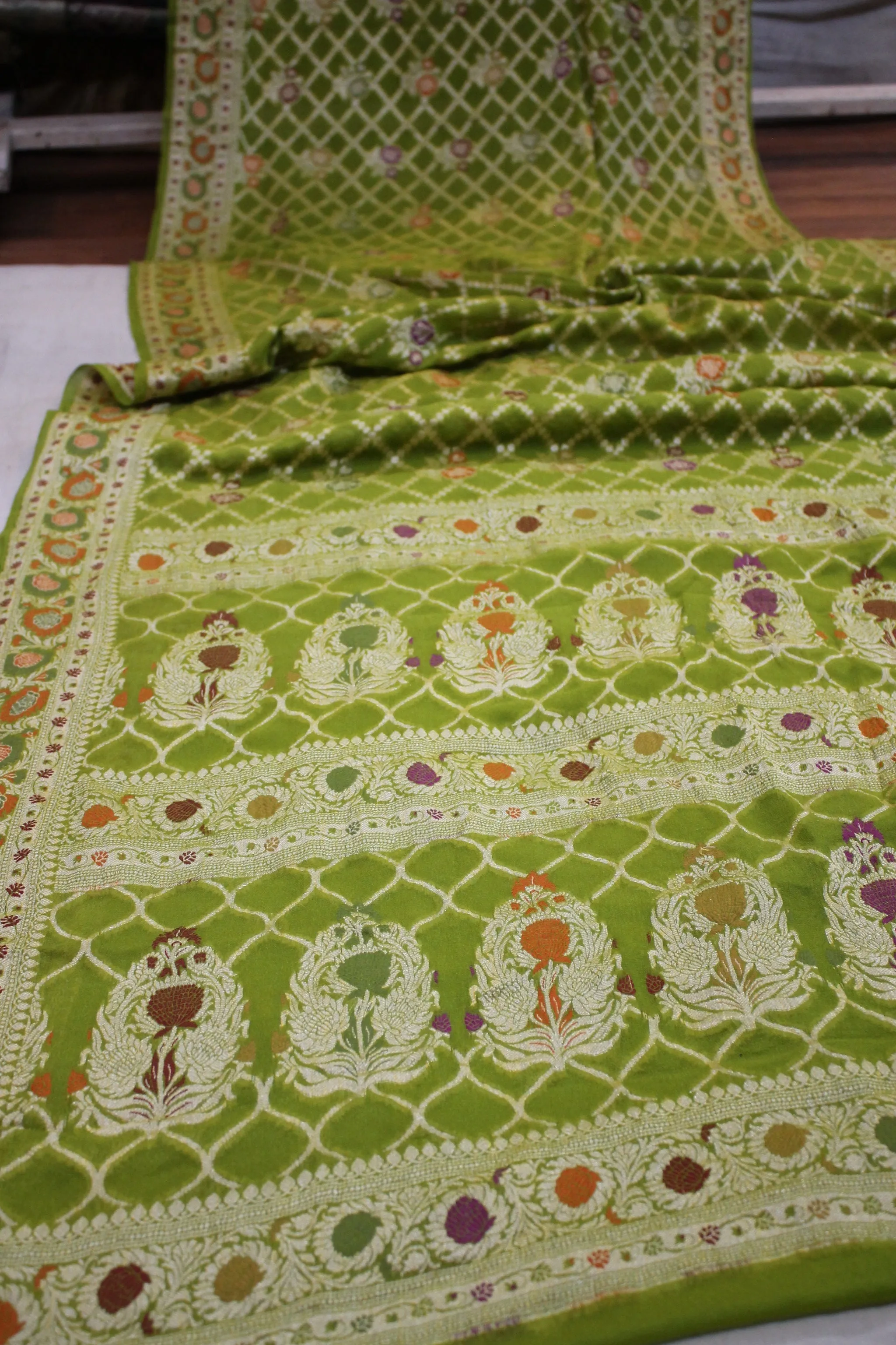 Natural Elegance: Leaf Green Jaal Tilfi Pure Khaddi Georgette Banarasi Sari